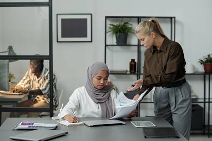 Woman in hijab being treated poorly at work - Racial Discrimination